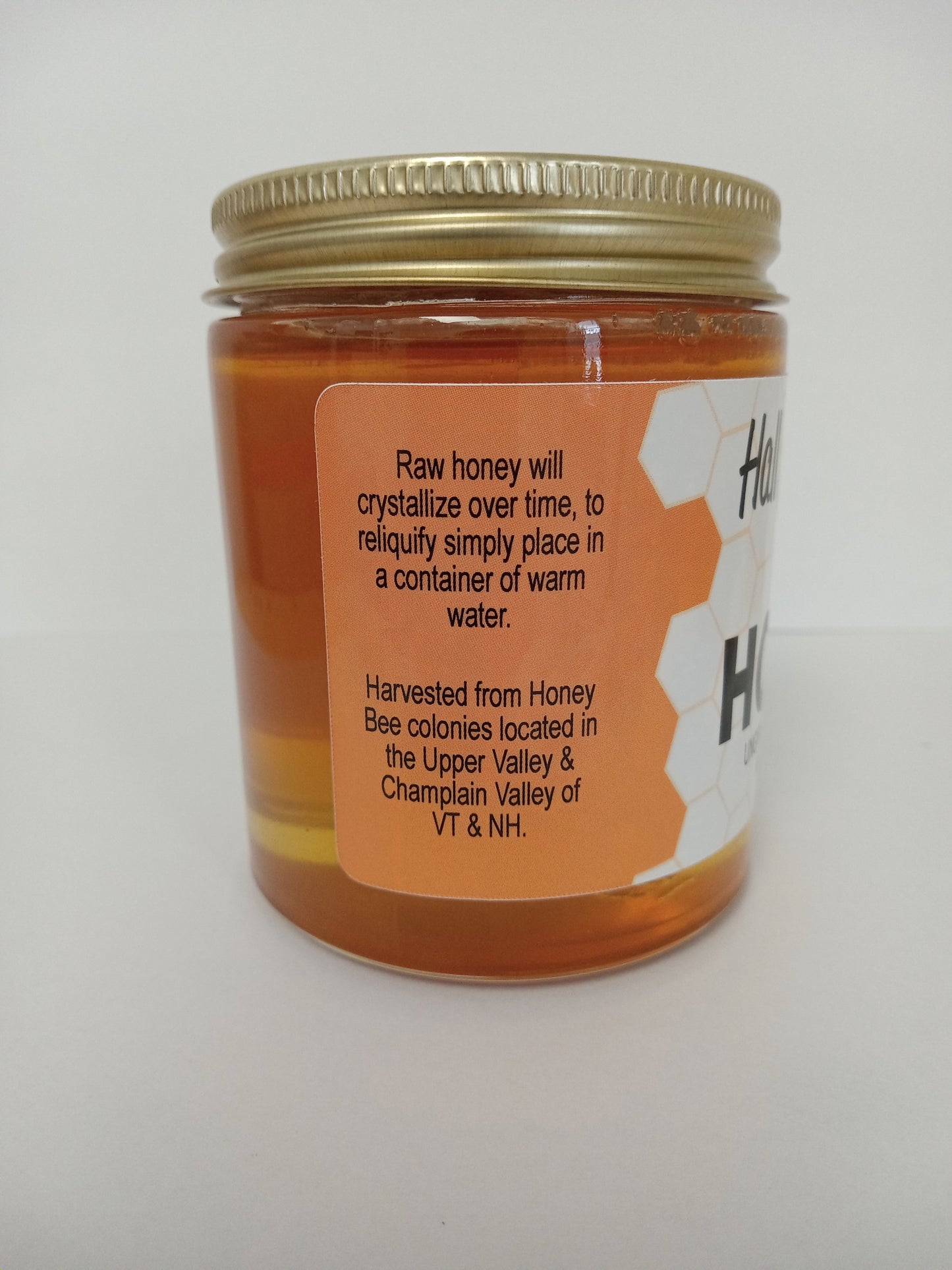 Description portion of the label on a jar of Hall Apiaries raw ungraded and unheated honey