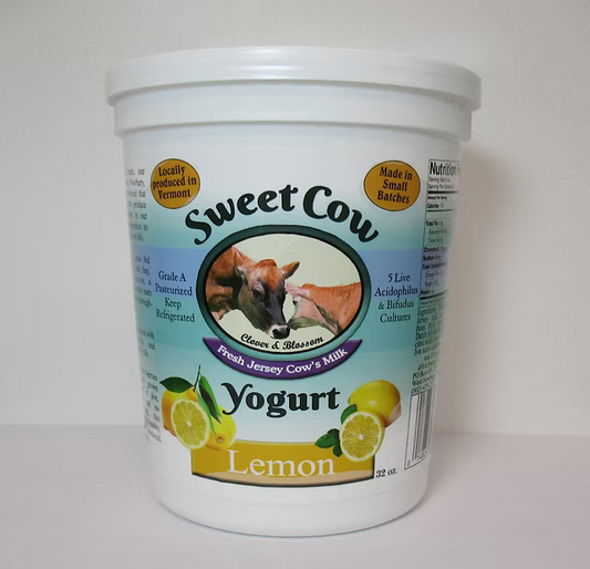 Container of Sweet Cow Lemon Yogurt on a white background