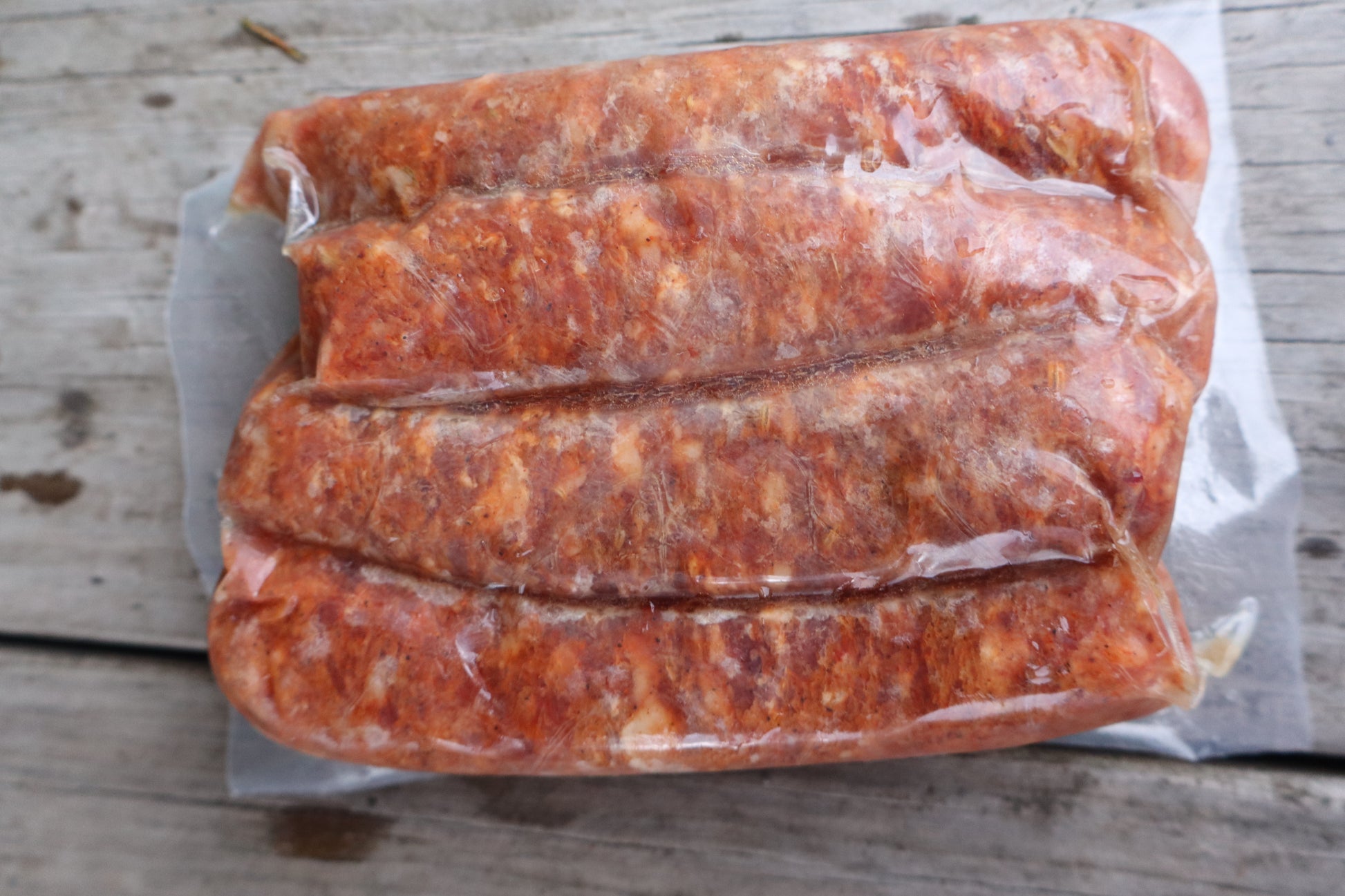 Backside of a package of 4 hot Italian pork sausage links from Robie Farm