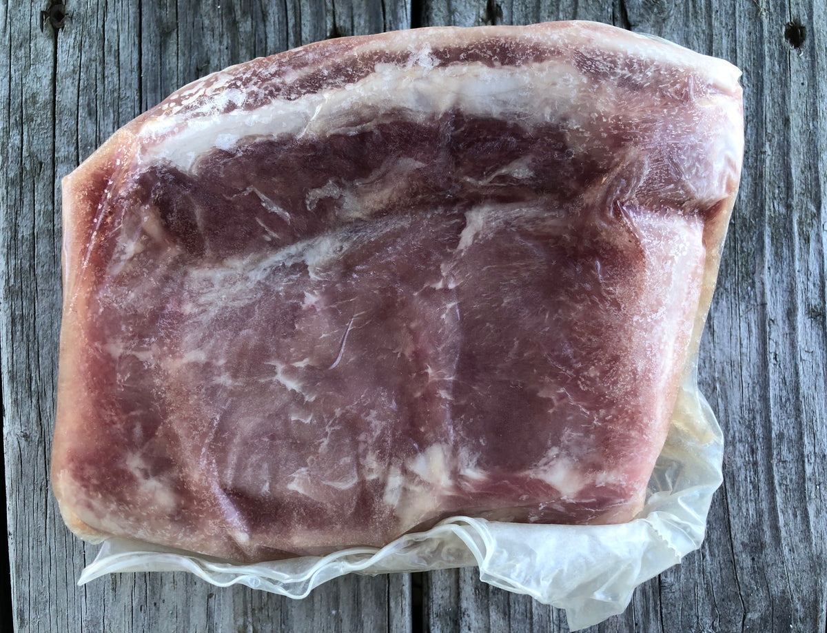 Boneless pork loin in a vacuum sealed bag