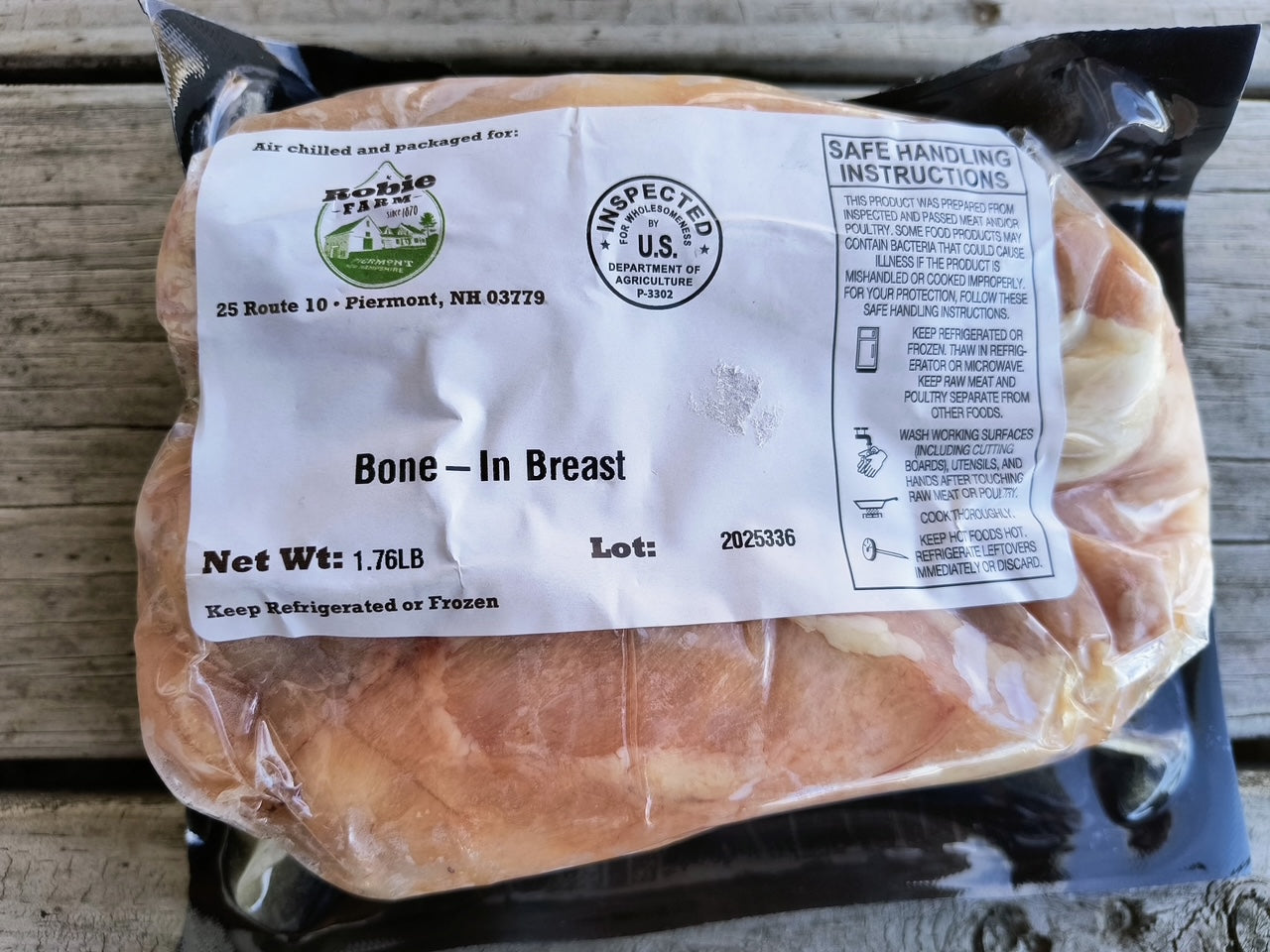 Photo of bone-in pasture raised chicken breast from Robie Farm