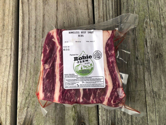 A vaccum-sealed package of Robie Farm boneless beef short ribs