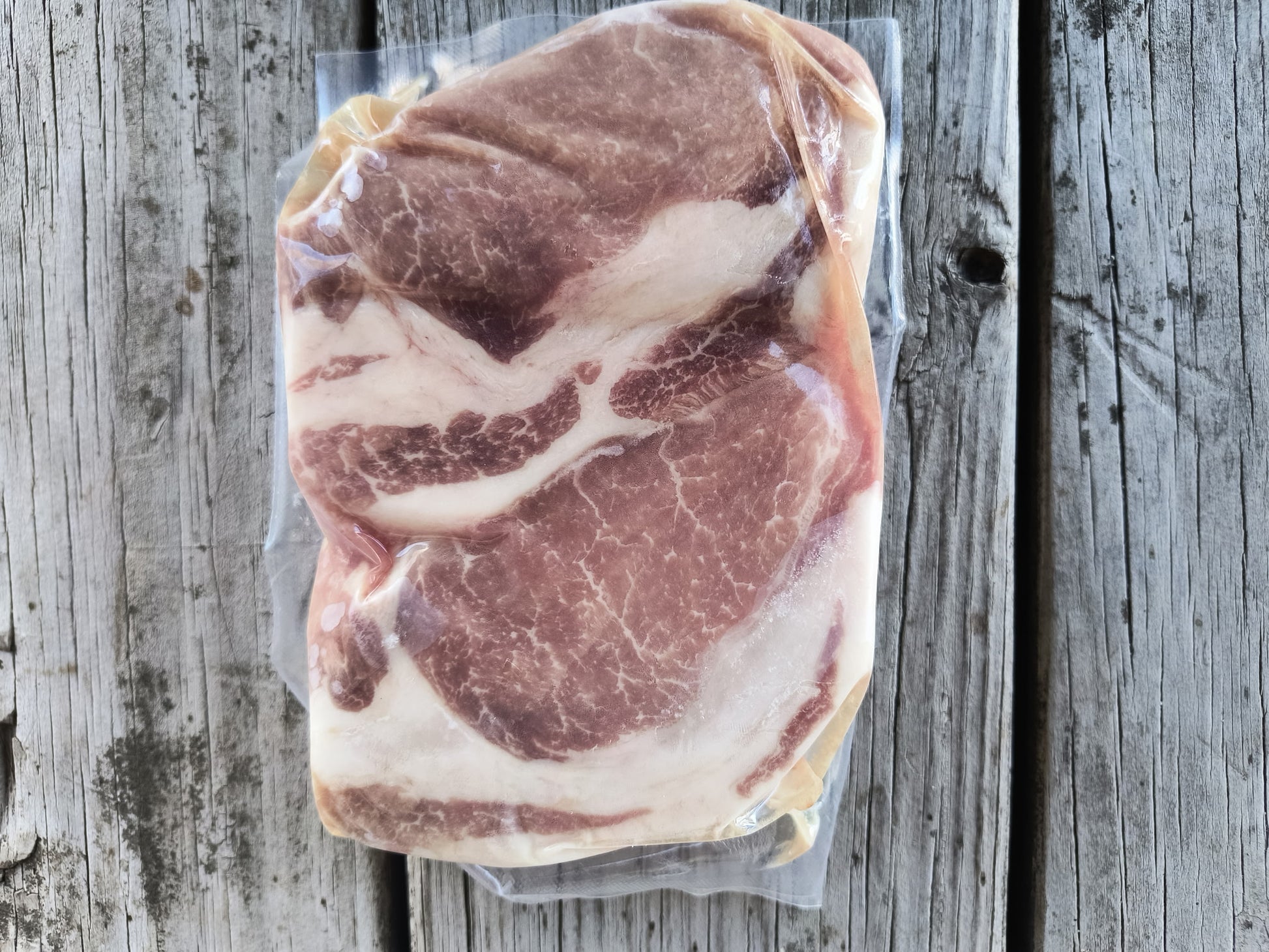 Backside of a package of boneless pork