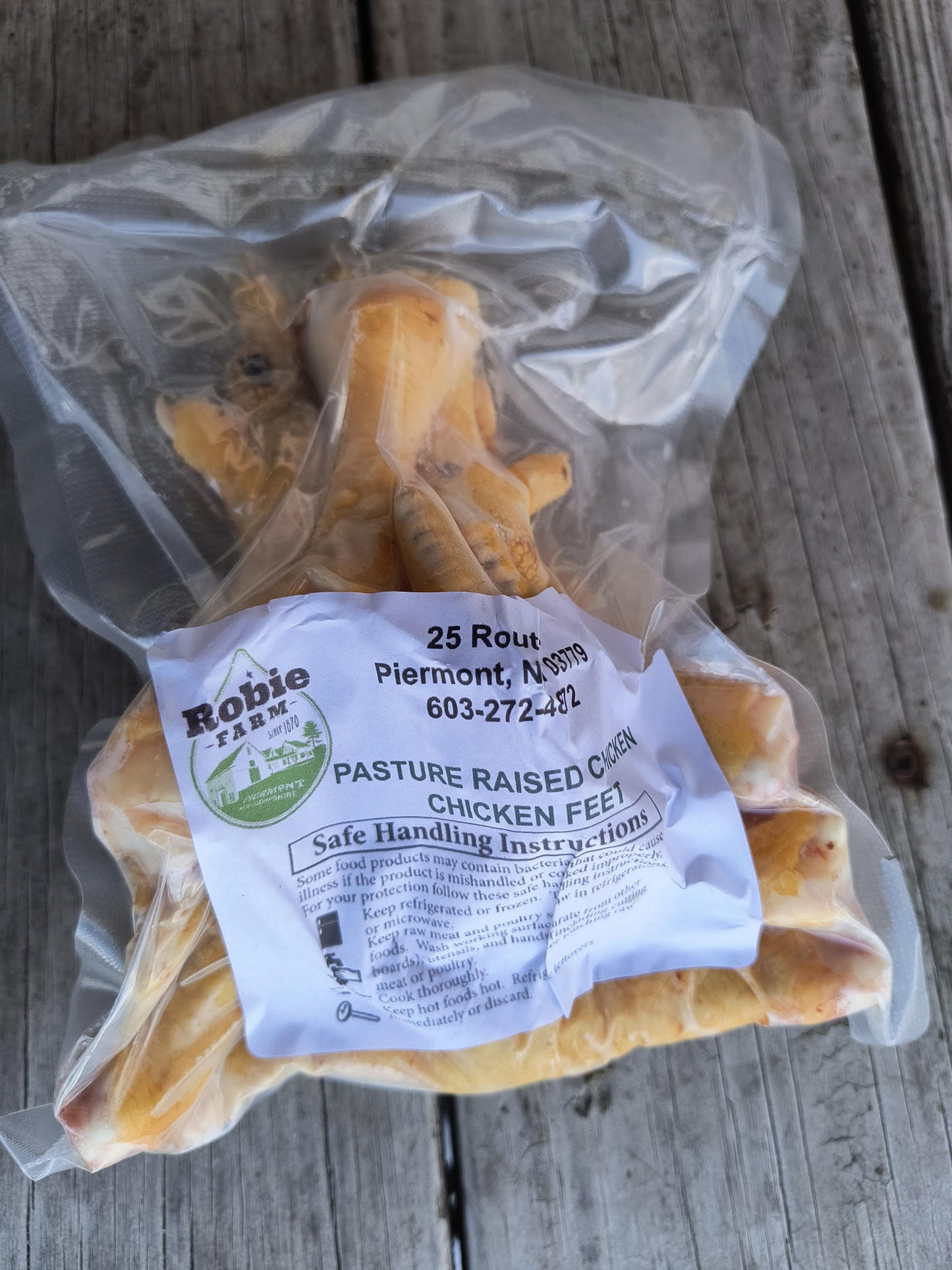 image of a package of Robie Farm pasture raised chicken feet