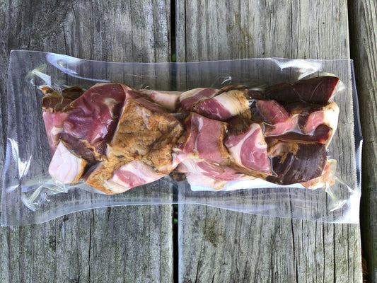 Vacuum-sealed package of Robie Farm uncured pork bacon ends
